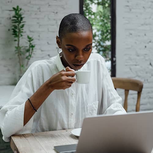 African Woman Reading Blog